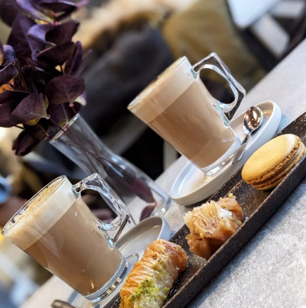Latte and macarons in our Florist Café